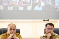 Sumber foto dari facebook Kominfo Tebo, Bupati dan Wakil Bupati Rapat virtual.